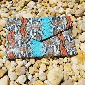 Snake print clutch